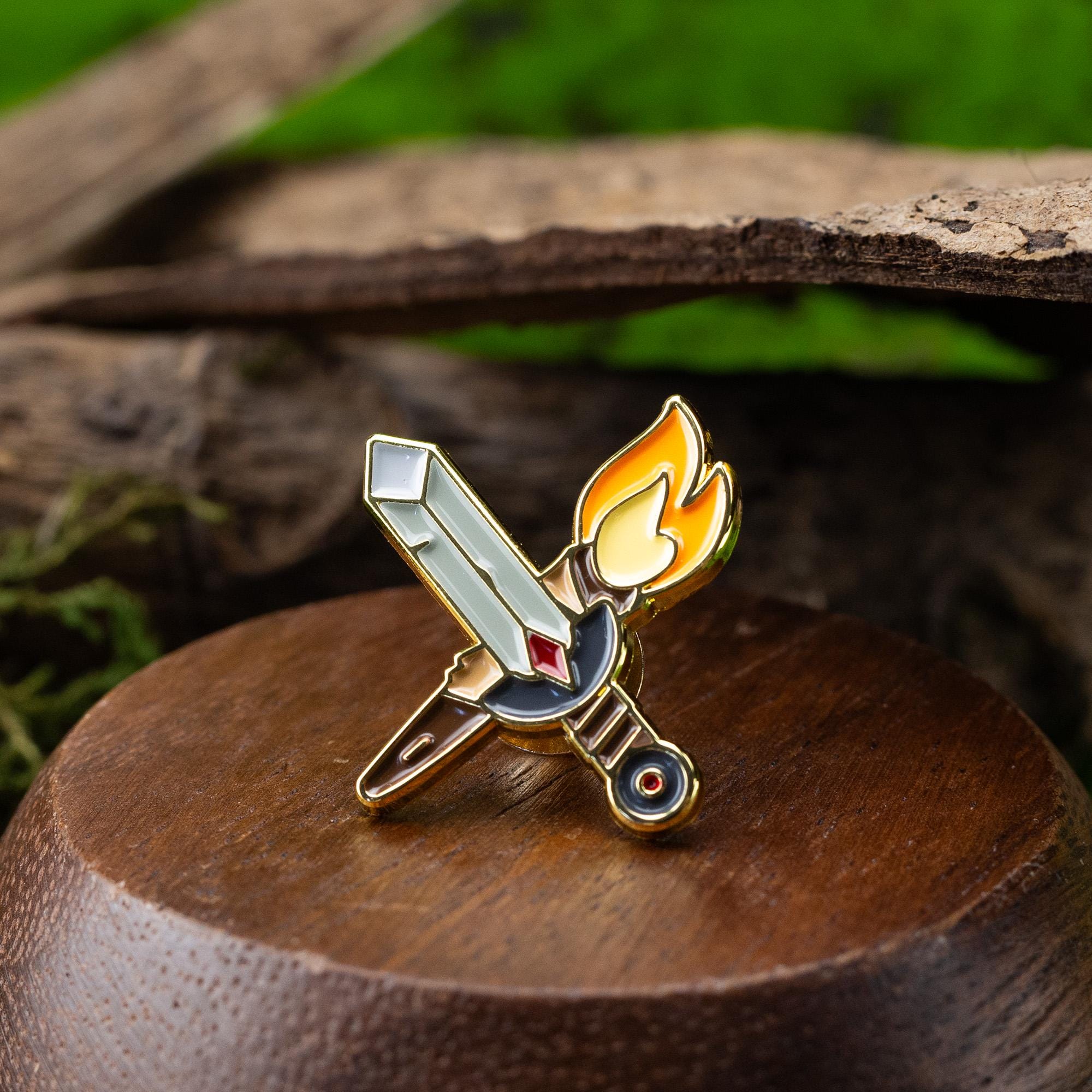Sword and Torch Enamel Pin