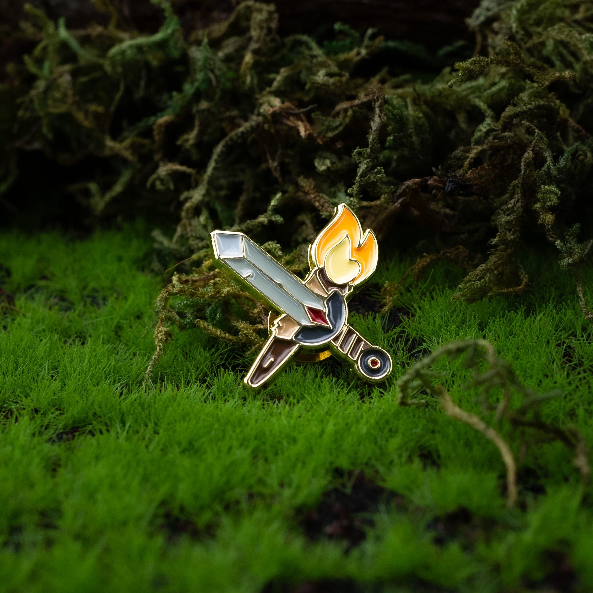 Sword and Torch Enamel Pin